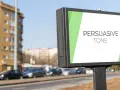 Billboard with "PERSUASIVE TONE" text on a white background with green accents.